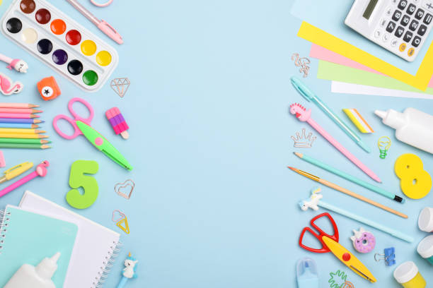 istock Flat lay office supplies. Office on a blue background with space for text. 1335246737