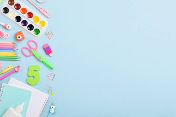 istock Flat lay office supplies. Office on a blue background with space for text. 1335246753