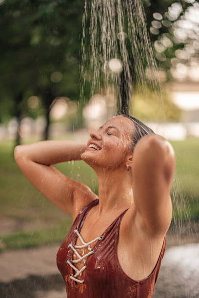 istock Taking a shower after swimming outdoors. 1335250227