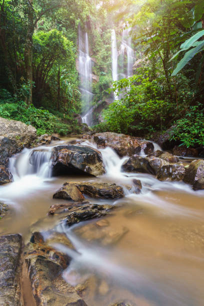istock Mork fa Waterfall, Double Waterfal in deep forest Chiang Mai, Thailand 1335253442