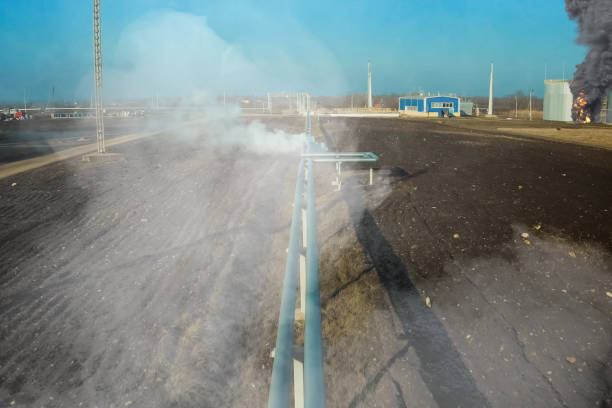 istock Collage. Fire at refinery. Flames and smoke of fire. 1335254490