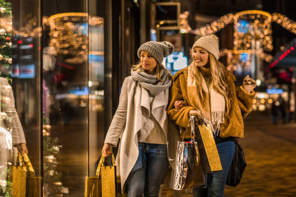 istock Two Beautiful Women at Winter Shopping 1335256239