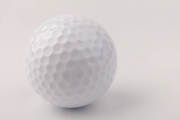 istock golf ball isolated on white background 1335257096