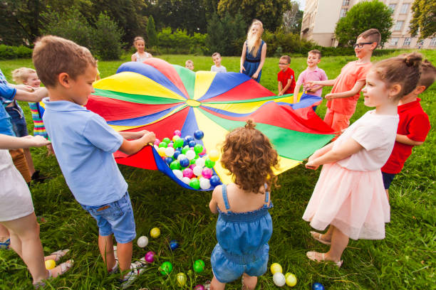 istock Group Of People Enjoying In Park 1335257831