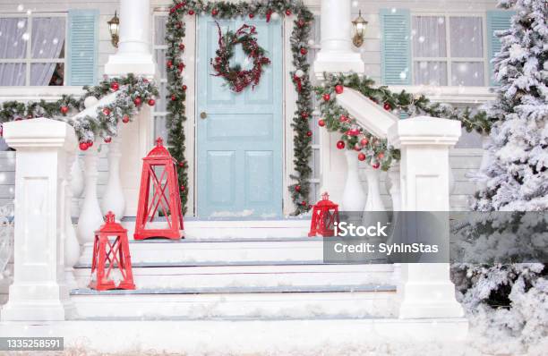Christmas Porchsnowy Courtyard With Christmas Porch Veranda Wreath Christmas Tree Garlandchristmas Balls And Lanterns Merry Christmas And Happy New Year Stock Photo - Download Image Now