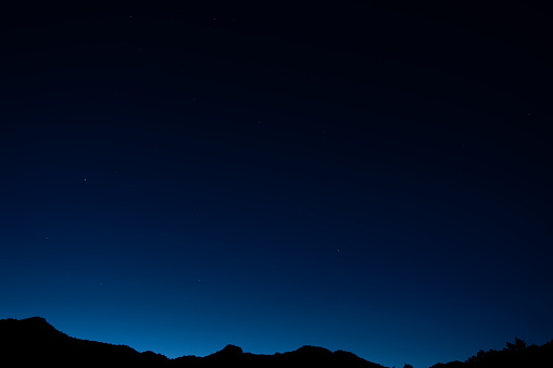 Starry sky and ridgeline before dawn / Kawakami Village, Nagano Prefecture