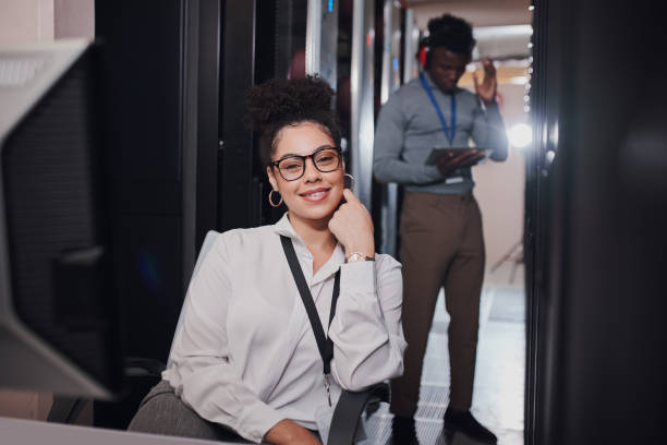 istock Portrait of a young woman using a computer while working in a data center 1335264620