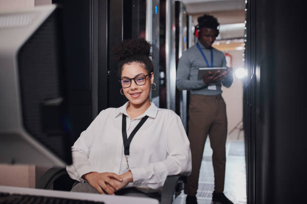 istock Portrait of a young woman using a computer while working in a data center 1335264622