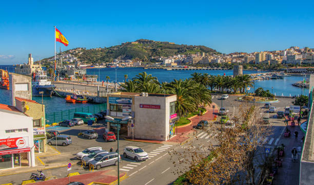 ferry terminal in the port of ceuta, spanish territory in north africa, spain. - spain flag built structure cloud imagens e fotografias de stock