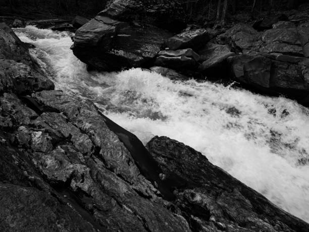 istock White water of a river flowing through a rocky gorge 1335264758