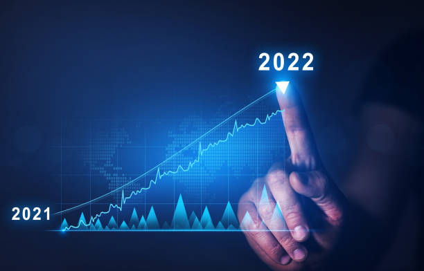 istock Businessman draws  increase arrow graph corporate future growth year 2021 to 2022.   Development to success and motivation. 1335267671
