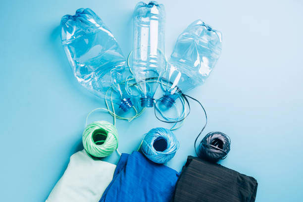 istock Polyester fiber synthetic fabrics eco-friendly textile recycled recyclable plastic bottles. Reuse recycling used bottles 1335269806