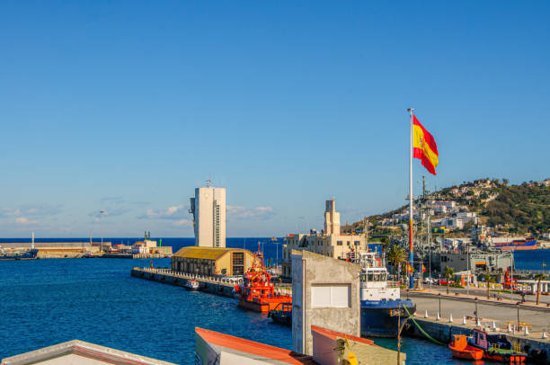 fährterminal im hafen von ceuta spanien, spanisches territorium in nordafrika marokko. - spain flag built structure cloud stock-fotos und bilder