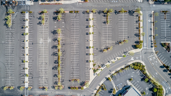 High quality aerial photos of an empty mall and parking lot in California.