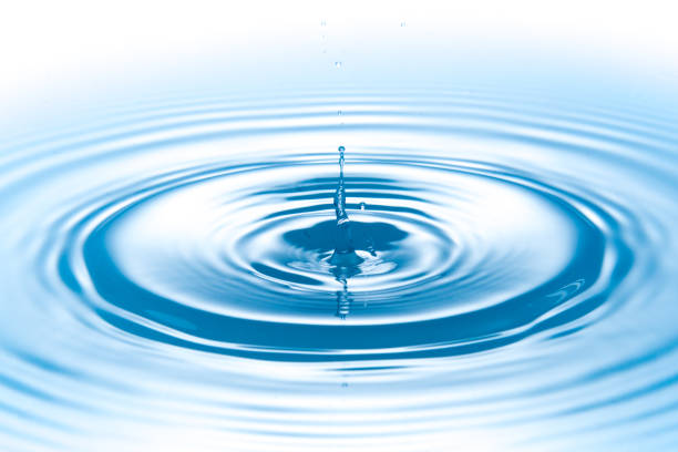 istock drop of water with rippled 1335285073