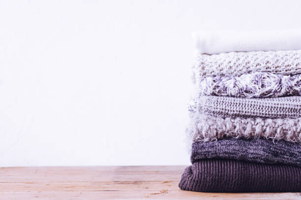 istock Pile of knitted woolen sweaters 1335286353