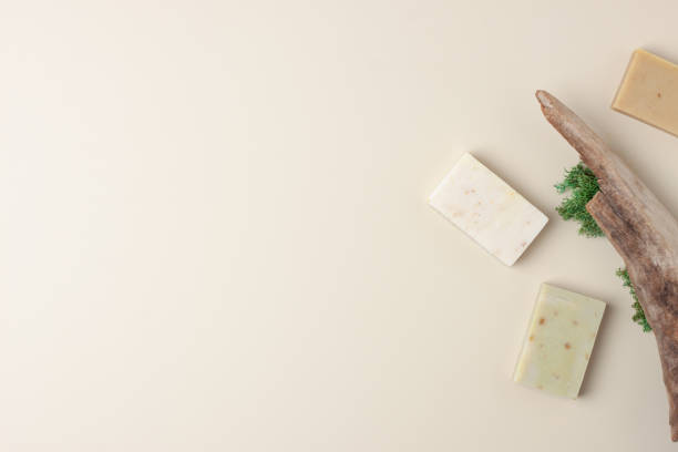 istock Soap and wood on beige background. Flat lay, copy space. 1335291212