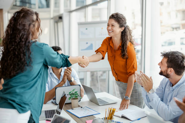 istock Businesswomen Shaking Hands 1335296129