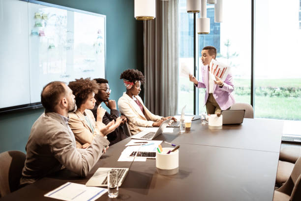 istock Female executive disappointed in corporate colleagues 1335298463