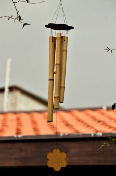 istock Bamboo winds bell on cloudy day in backyard 1335298669