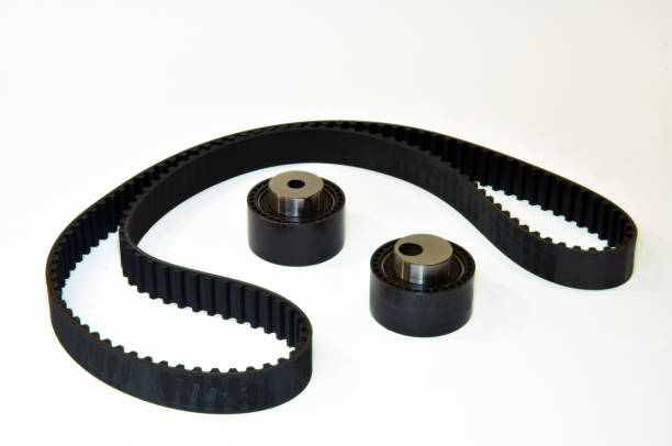istock The timing belt and rollers stands on a white background 1335303585