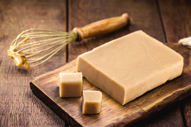 istock Brazilian dulce de lethe in tablet on wooden table. 1335306044
