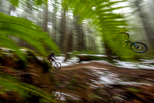 They compete in a downhill race, in Squamish, BC