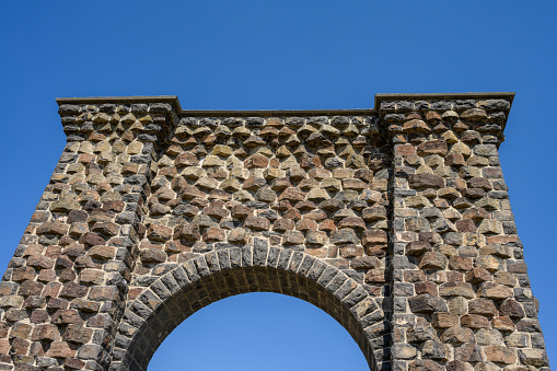 Roosevelt Arch on a bright sunny day, Yellowstone National Park, USA