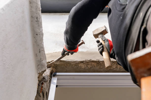 istock Adult male working with a sledgehammer and chisel. Masonry work. Home construction and repair. 1335315067