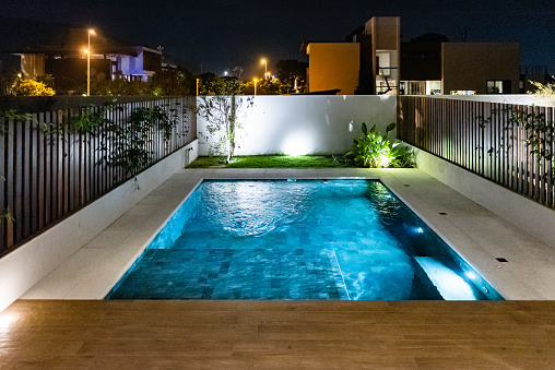 Night view of the backyard pool