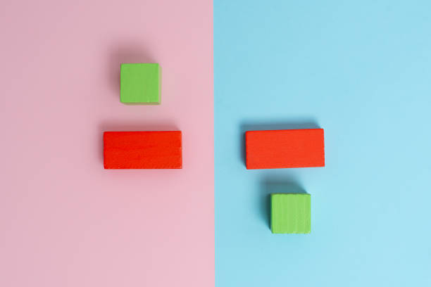 istock Comparison of Two Objects Blocks Pencils Sticker Notes Facing Inward Outward Making An Arrangement Reflection On a Separated Coloured Background Shot In A Flat Lay Perspective 1335317077