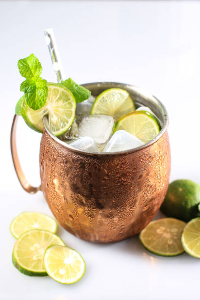 istock Icy Cold Moscow Mules with Ginger Beer, Lime,  and Vodka, Garnish with Mint Leaf 1335318156