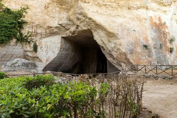 Photo of Natural Landscapes of The Neapolis Archaeological Park (Grotta dei Cordari) in Syracuse, Sicily, Italy.