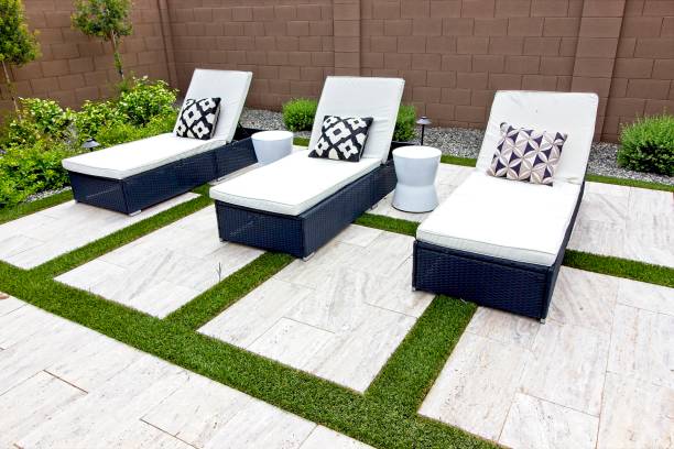istock Three Wicker Lounge Chairs In Rear Yard 1335328460