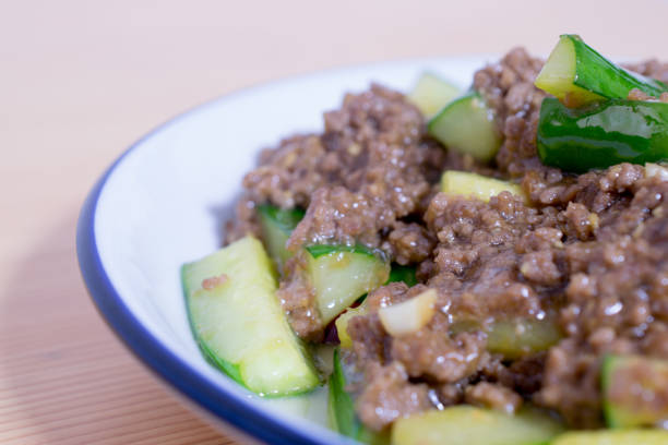 istock Stir-fried nutritious cucumber and minced meat on the table 1335329836