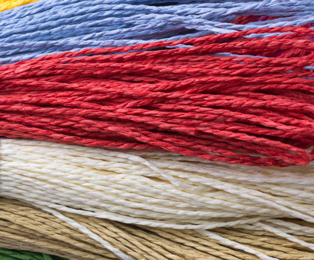istock paper yarn strings closeup, colorful background wallpaper 1335340459