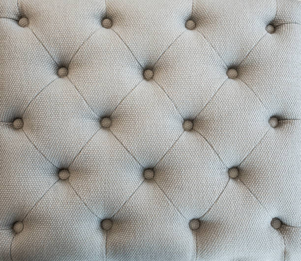 istock Beautiful velvet sofa on the background. 1335345534