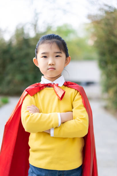 istock Supergirl Arms Crossed 1335349359