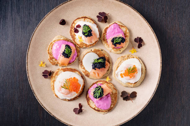 Assorted Blinis With Prawns, Smoked Samon and Caviar.