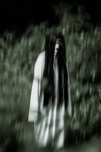 istock Scary female Japanese ghost in a forest 1335360006