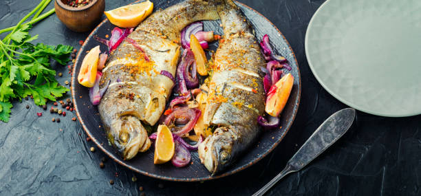 istock Whole baked rainbow trout. 1335361112