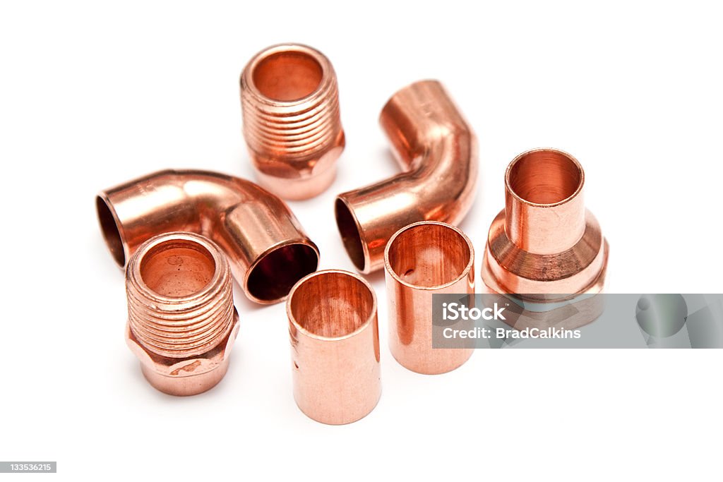 Copper tubing Copper tubing parts on white background Construction Industry Stock Photo