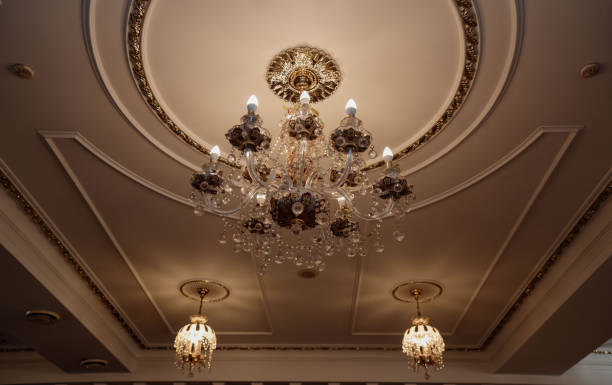 istock vintage gold chandeliers on a light ceiling 1335364100