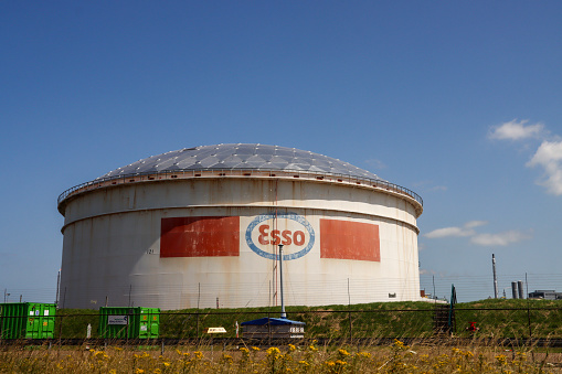 Oil storage tanks at the exxonmobil refinery in the Botlek harbor in the port of Rotterdam Netherlands