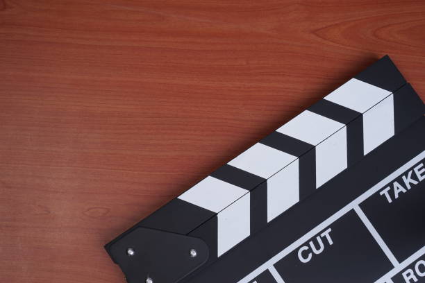 istock Film clapperboard flat lay. Movie concept. 1335365216
