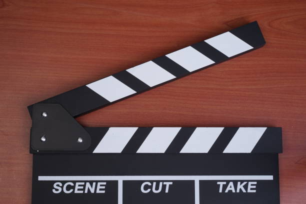 istock Film clapperboard flat lay. Movie concept. 1335365219