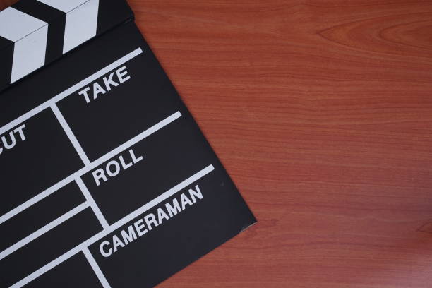 istock Film clapperboard flat lay. Movie concept. 1335365233