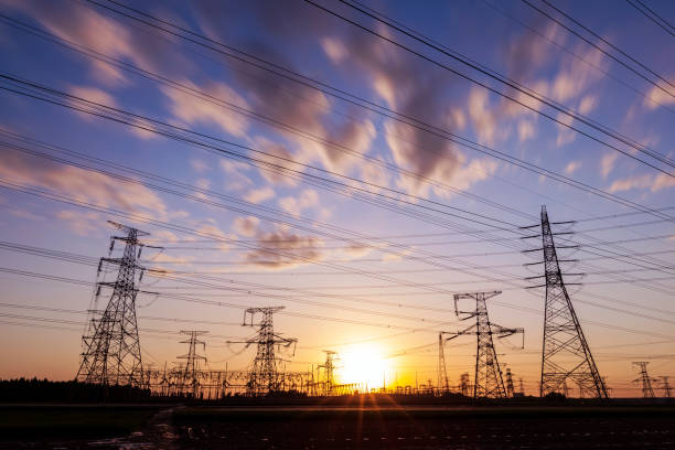 istock Pylons, high voltage pylons in the evening 1335366456