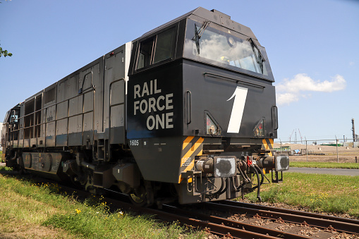 Vossloh locomotive from Rail Force One leaving shunting yard in the Port of Rotterdam in the Netherlands