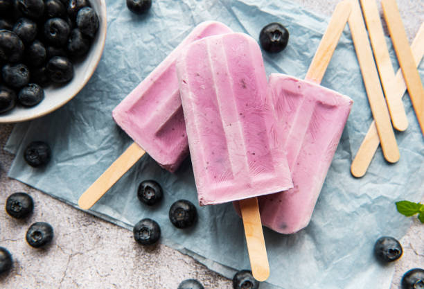 istock Ice cream popsicles from fresh organic blueberries. 1335368861
